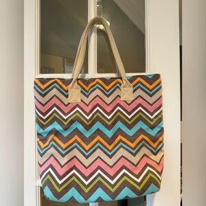 CUTE, happy tote bag! Chevron multicolor pattern, lined bag with zip pocket.